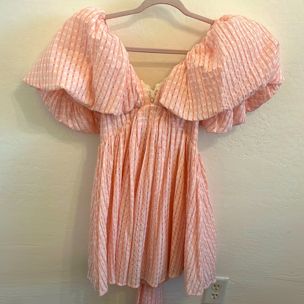 Adorable, pink and white baby doll puff sleeve dress